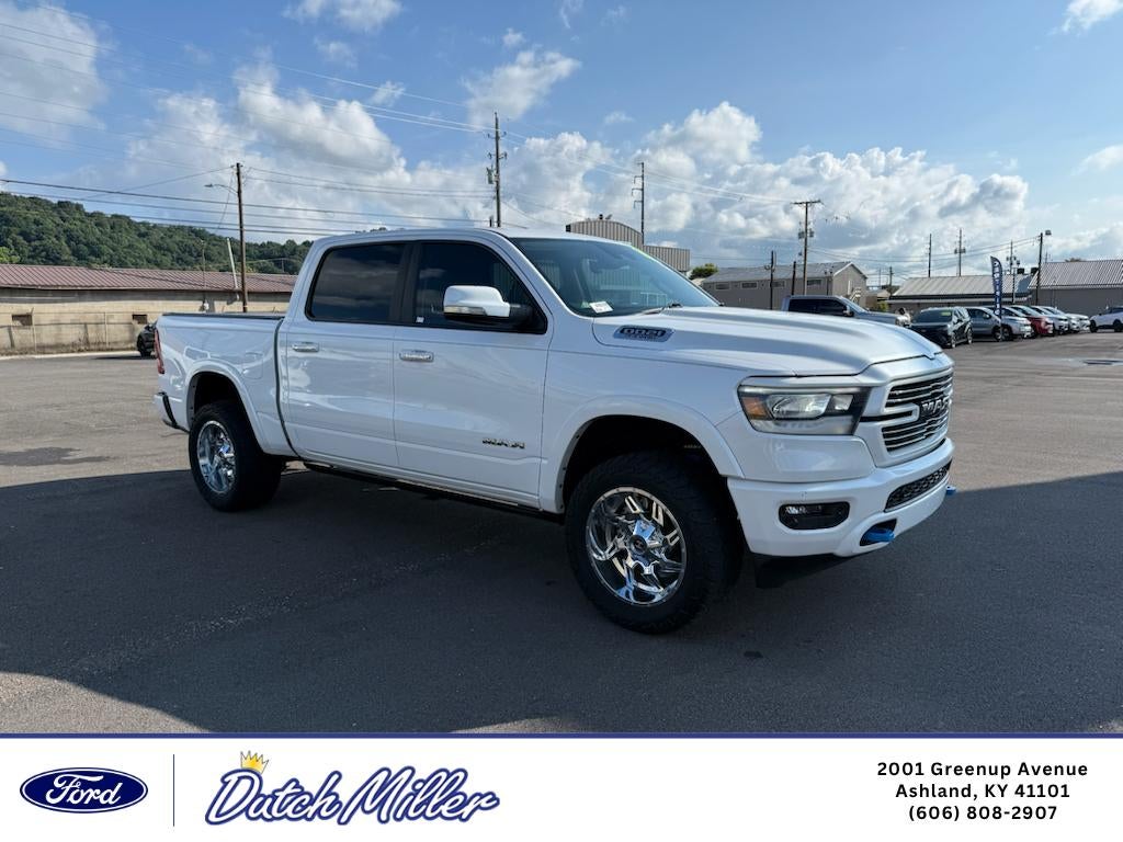 2021 RAM 1500 Laramie in Ivory White Tri-Coat Pearlcoat — front three-quarter view